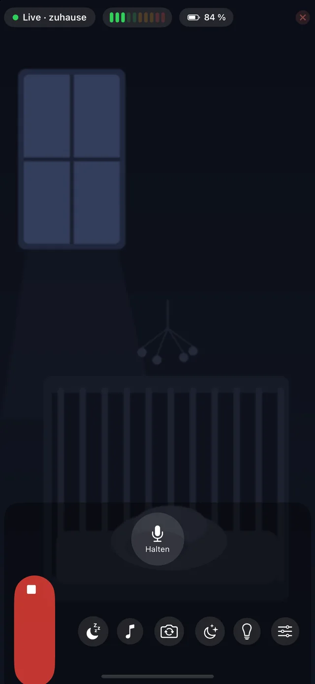 HeyFini-Elternstation: Live-Bild aus dem dunklen Kinderzimmer mit Pegel-Anzeige, Akku der Babystation und Gegensprech-Knopf